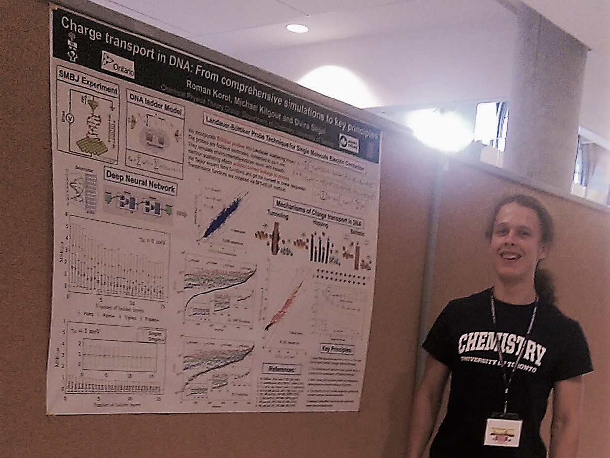 Roman next to his poster wearing a University of Toronto Chemistry T-shirt