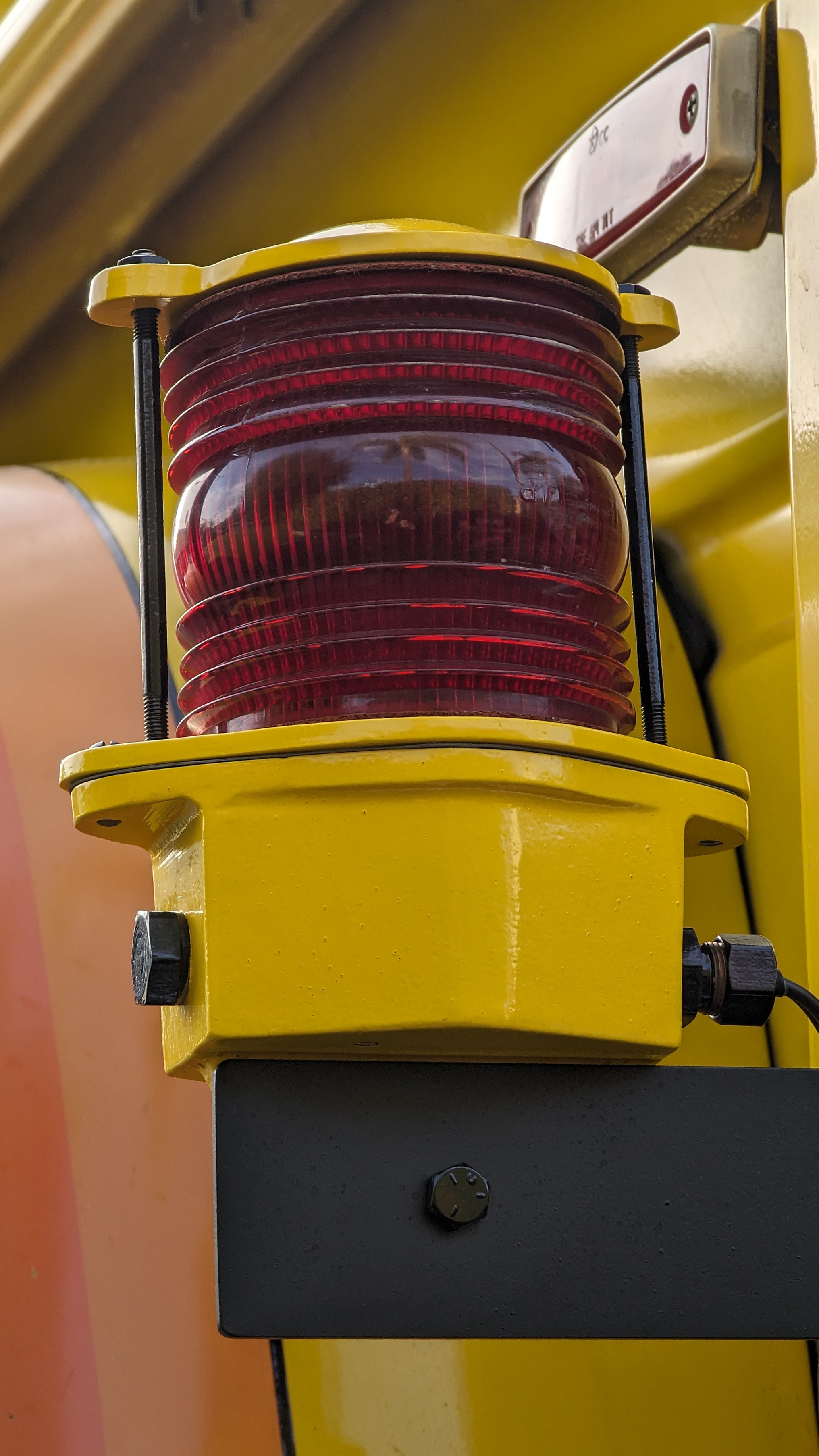 Old style barrel shaped railroad crossing gate red light, powder coated yellow to match truck